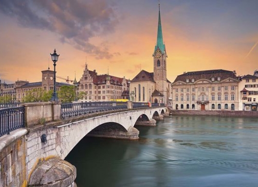 Image of Zurich during dramatic sunrise.