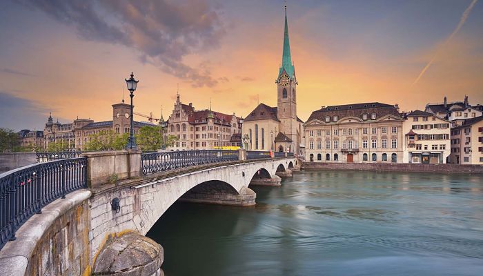 Image of Zurich during dramatic sunrise.