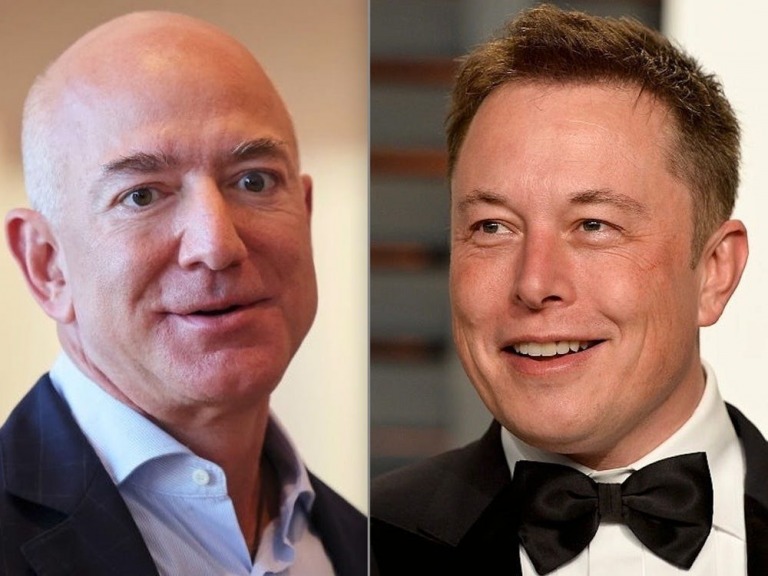 Tỷ phú Jeff Bezos (trái) và tỷ phú Elon Musk. Ảnh Pascal Le Segretain/Getty Images và Michael M. Santiago/Getty Images